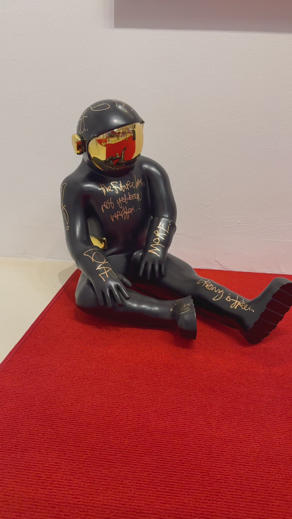 Sitting Spaceman Sculpture